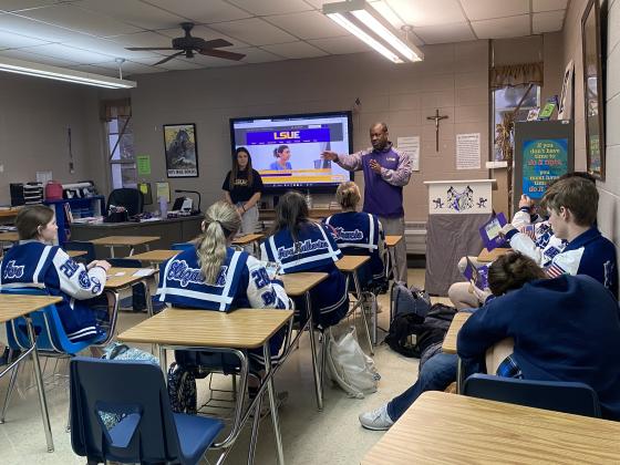 Chad Jones, institutional liaison officer with LSUE, and Kennedy Ardoin, current LSUE student and recent St. Edmund graduate, paid a visit to St. Edmund juniors.