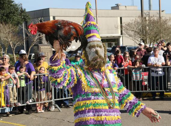 Chicken under control at the 2022 Mardi Gras. (Photo by Harlan Kirgan)