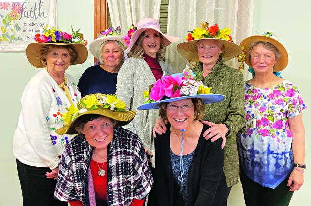 During the February meeting of the Bulb & Blossom Garden Club, members expressed their yearning for spring by adorning hats of various shapes and sizes with assorted flowers and butterflies. Members modeling their creations, front from left, are Lynn Pavich and Celeste Gomez. In the back, from left, are Joyce Johnson, Fran Guillory, Martha Guempel, Barbara Wells and Erin Jones. The club’s  next meeting is set for March 5.  (Submitted photo)
