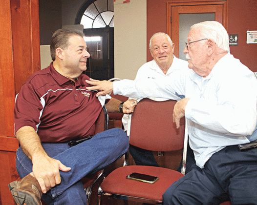 The St. Landry Parish Council meeting on Wednesday was a perfect time for some conversation for, from left, Richard LeBouef, Kenneth Vidrine and Earl Taylor. (Photo by Harlan Kirgan)
