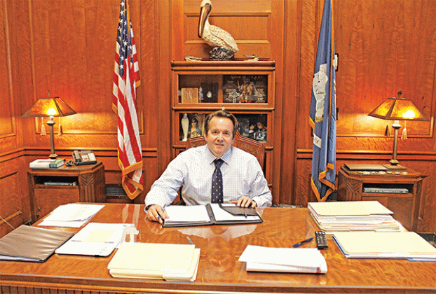 Speaker of the House and State Representative Phillip DeVillier sits at his desk in his office at the state capitol. DeVillier, of Eunice, was first elected as a state representative in 2015. (Photo by Claudette Olivier/Church Point News)