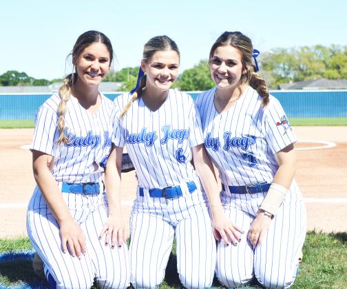 St. Edmund’s Rylie Johnson, Karleigh Soileau and Kennedy Ardoin finished their high school soffball careers Wednesay in the regional round of the playoffs. (Photo by Tom Dodge)