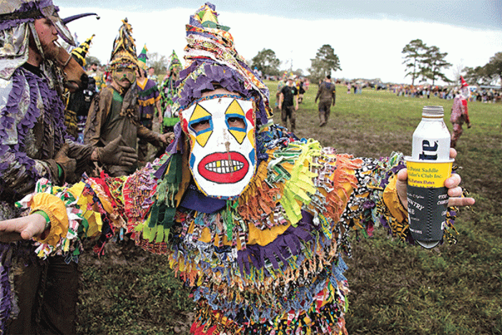 A Mardi Gras runner poses for a photo by David Simpson during the  Church Point Courir de Mardi Gras on Feb. 23, 2020.