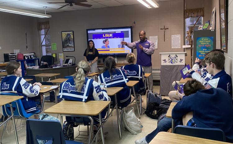 Chad Jones, institutional liaison officer with LSUE, and Kennedy Ardoin, current LSUE student and recent St. Edmund graduate, paid a visit to St. Edmund juniors.
