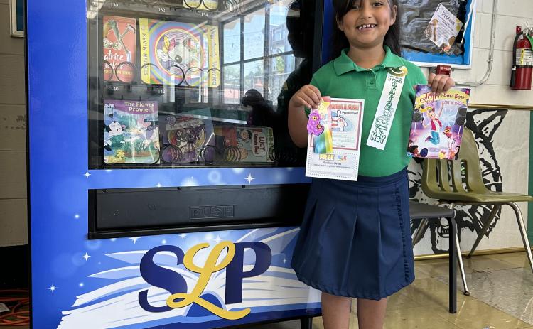 Mia Gonzales, a second grader in Caitlyn Estes’ class at East Elementary has reached and exceeded her AR goal of 25 points. She was rewarded with a certificate, prizes, and was able to choose her own new book from the book machine. (Submitted photo)