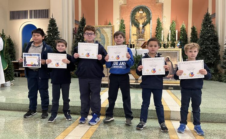 St. Edmund students were recognized after an All-School Mass for completing their first quest in the Boost Reading Intervention Program