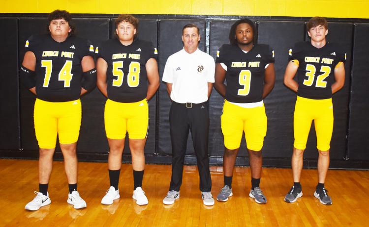 Church Point head coach Riob Pool, center is joined by offensive players Gavin Benoit, Carter Fontenot, Jaden Reese and Bryce Lejeune. (Photo by Tom Dodge)