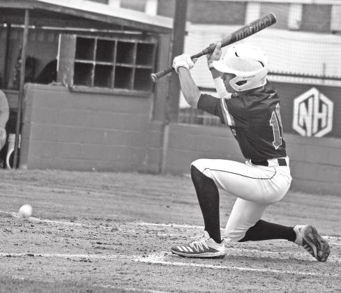 Eunice High’s Dru Phillips puts down a bunt against North Vermilion. (Photo by Tom Dodge)