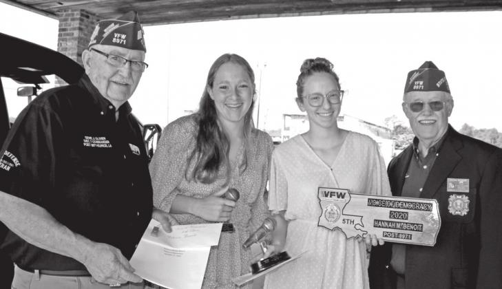 Rebecca Benoit and Hannah Benoit, both seniors at St. Edmund High, placed in the VFW and Auxiliary sponsored Voice Of Democracy contest. Rebecca placed second and Hannah placed first. From left, are Gene Olivier, Rebecca Benoit and Hannah Benoit, and Don Reber. Hannah Benoit advanced to district and placed first and fifth place at state. (Photos by Myra Miller)