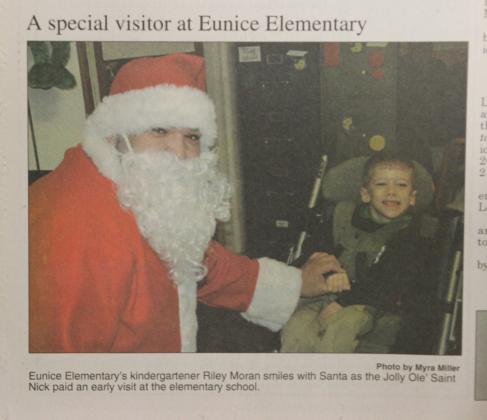 A special visitor at Eunice Elementary. Eunice Elementary’s kindergartener Riley Moran smiles with Santa as the Jolly Ole’ Saint Nick paid an early visit at the elementary school.