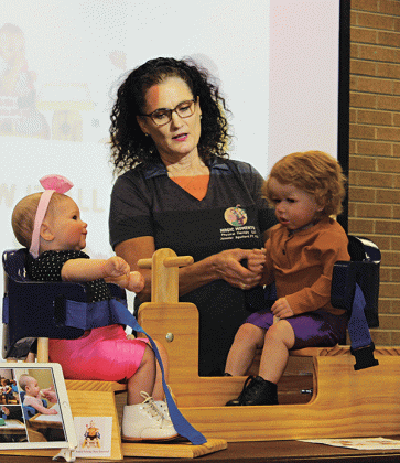 Jennifer Aguillard, a physical therapist and Board certified pediatric clinical specialist, was the guest speaker last week at the Eunice Rotary Club. She developed and patented Anni’s Activity Chair, an early intervention chair. (Photo by Myra Miller)