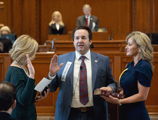 Rep. Phillip DeVillier, center, is sworn in as Speaker of the House by Clerk Michelle Fontenot, left, with his wife, Lisa DeVillier at right, on legislative Inauguration Day, Monday at the Louisiana State Capitol in Baton Rouge. (Hilary Scheinuk/The Advocate via AP Pool)