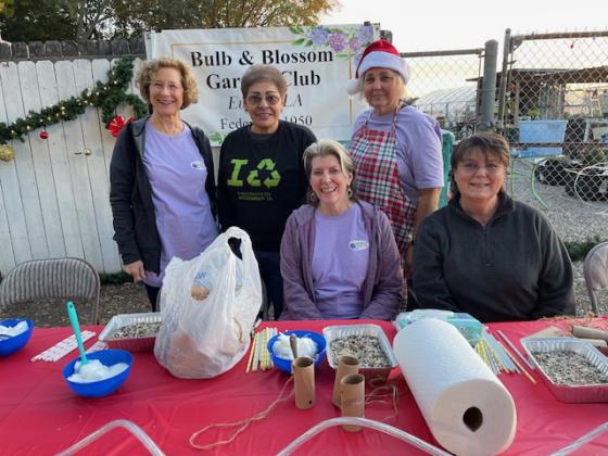 In early December, the Bulb and Blossom Garden Club took part in the annual Christmas Festival at the Eunice Community Garden.