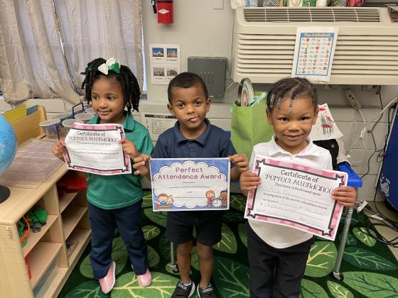 Receiving Perfect Attendance at Highland in Michelle Guillory’s class are O’Brian Anderson, left, Landon Freeman and Aria Freeman.