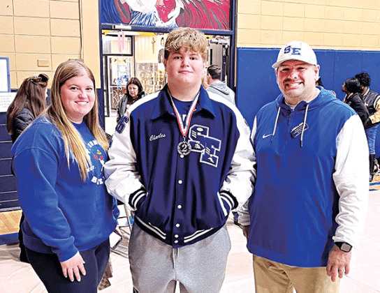 The Blue Jay’s Powerlifting team competed at the Sacred Heart Invitational on Saturday. SEH Junior, Charles Sonnier was second overall in the Super Heavy Weight division. He squatted 510 lbs, dead lifted 445 lbs. and broke the Super Heavy Weight meet record on bench at 305 lbs. He is with his sister, Laura Sonnier and Coach Corey Diaz. Photo by Dusty Sonnier)