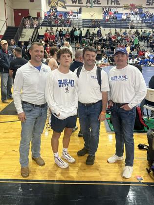 For St. Edmund wrestling sophomore Cooper Berzas, the road to the finals of the prestigious Ken Cole Invitational was paved with elite competition, personal redemption, and program-defining significance. From left are Coach Garrett Berzas, Cooper Berzas, Head Coach Shane LeBleu, and Coach Jason Sonnier. (Submitted photo)