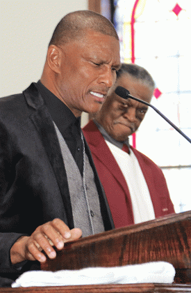 Eunice native Bishop Brian Stevens was the speaker at the Dr. Martin Luther King Jr. program on Sunday at New Zion Baptist Church. Behind Stevens is the Rev. Mack Frank. Stevens pastor of the Faith Hope Missionary Baptist Church in Abbeville. He and his wife, Ulander, are Eunice High School graduates. (Photo by Harlan Kirgan)