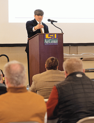 LSU AgCenter economist Michael Deliberto speaks during the Louisiana Agricultural Outlook Forum Jan. 10 at the State Evacuation Shelter near Alexandria. (Photo by Olivia McClure/LSU AgCenter) 