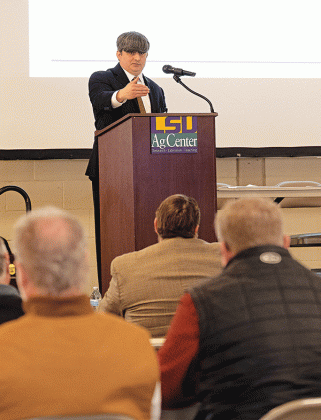 LSU AgCenter economist Michael Deliberto speaks during the Louisiana Agricultural Outlook Forum Jan. 10 at the State Evacuation Shelter near Alexandria. (Photo by Olivia McClure/LSU AgCenter)