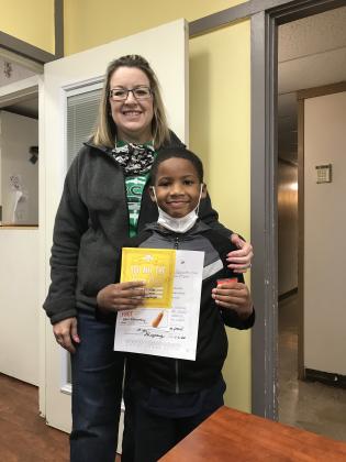 Principal Gina LaGrange and Joshua Cornerly