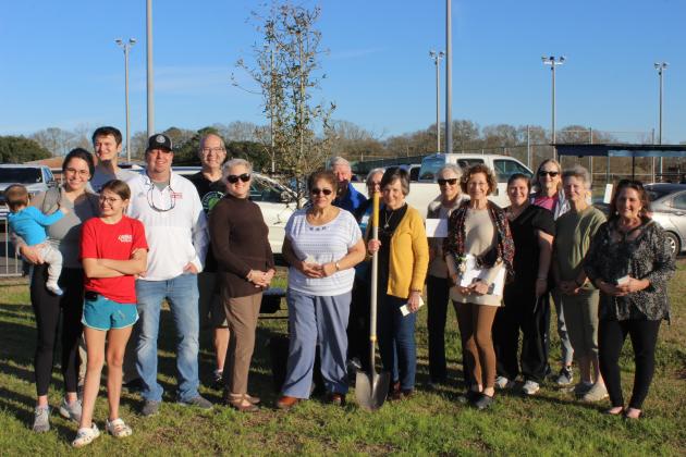 A live oak was planted at the Fairgrounds on Jan. 19 in Memory of the late Andrea West, a Bulb &amp; Blossom Garden Club member. Arbor Day is recognized in Louisiana on January 20 every year. The Bulb &amp; Blossom Garden Club members held an Arbor Day program and some of Andrea’s family were present along with bulb members, as well as others. In front, from left, are August, Adonia and Marley O’Brien, Mayor Scott Fontenot, Kelly Pitre, Donna Baltakis, Lynn Pavich, Barbara Wells, Celeste Gomez, Jacquelyn Love, Mart