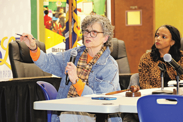 School Board member Mary Ellen Donatto, left, asks a question about a math curriculum to be introduced next school year. At right is Angela Cassimere, director of Curriculum, Assessment &amp; Accountability. The presentation on the math program was made a meeting of the School Board’s Academic Committee on Wednesday. Donatto is chairman of the committee. (Photo by Harlan Kirgan)