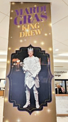 Former New Orleans Saints quarterback Drew Brees has been named of king of Washington Mardi Gras. A poster of him decorates the lobby of the Washington Hilton, where Washington Mardi Gras is held. (Photo by Julie O’Donoghue/Louisiana Illuminator)
