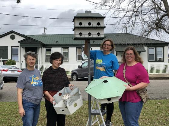 A recent photo of some of the Eunice Bulb and Blossom Garden Club members placing bird houses on Park Avenue. From left,  are Erin Jones, Lynn Pavich, Fran Guillory and April DeRouen. (Submitted photo)