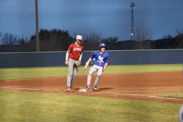 Pictured above is Lannie Reed rounding third base. (Photo by Amy Myers)