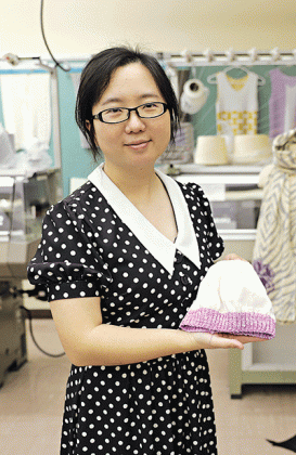 Sibei Xia, assistant professor in the Department of Textiles, Apparel Design and Merchandising, received a grant from the Provost’s Fund for Innovation in Research to develop thermochromic clothing to track newborns’ temperatures. (Photo by Annabelle Lang/LSU College of Agriculture) 