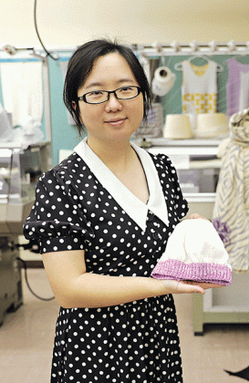 Sibei Xia, assistant professor in the Department of Textiles, Apparel Design and Merchandising, received a grant from the Provost’s Fund for Innovation in Research to develop thermochromic clothing to track newborns’ temperatures. (Photo by Annabelle Lang/LSU College of Agriculture)