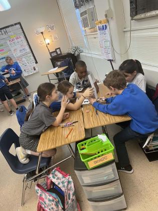 Students in Abbie Chapman’s third grade science class at St. Edmund Elementary are learning about weather and climate.
