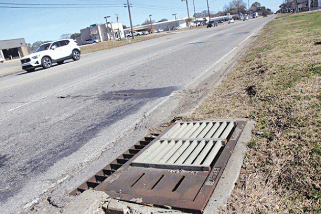 The slots on the curb side drains on U.S. 190 are credited in part with sparing the road from flooding on Jan. 24 and at other times. Mayor Scott Fontenot said Eunice may have been spared the worst of the heavy rainfall, but state Department of Transportation and Development’s installation of the slotted drain lids helped with drainage. (Photo by Harlan Kirgan)