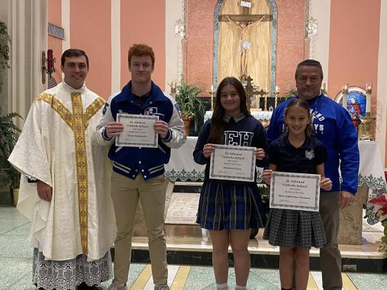 Students of the Year are named at St. Edmund Catholic School. From left are the Rev. John Dugas, Henry Summerlin, Twelfth Grade Students of the Year; Madeline Evans, Eighth Grade Student of the Year; Mary Katherine Fontenot, Fifth Grade Student of the Year; and Mitchell Fontenot, principal. (Submitted photos)