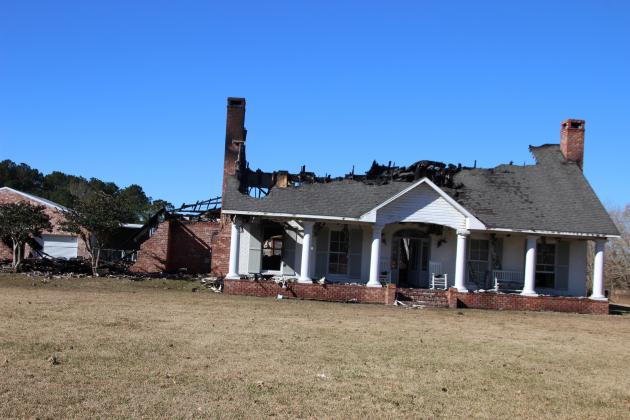 Fire destroys home on Dan Drive. (Photo by Myra Miller)
