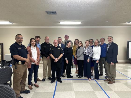 St. Edmund Catholic School honored and recognized community leaders. From left, are Deputy Chief Jeremy Ivory, Laura and Brett Garcille, Kyle LeBouef, Terry Darbonne, Jessie Bellard, Captain Devin Johnson, Lynn Pavich, Nancee Sorenson, Connie Thibodeaux, Alicia Mire, Nicole Sonnier, Kayla Heinen, Mitch Fontenot and Kevin Frank.