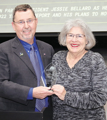 St. Landry Parish President Jessie Bellard presents his Presidential Award to Yvonne Lognion Normand at Tuesday’s State of the Parish program in Opelousas.