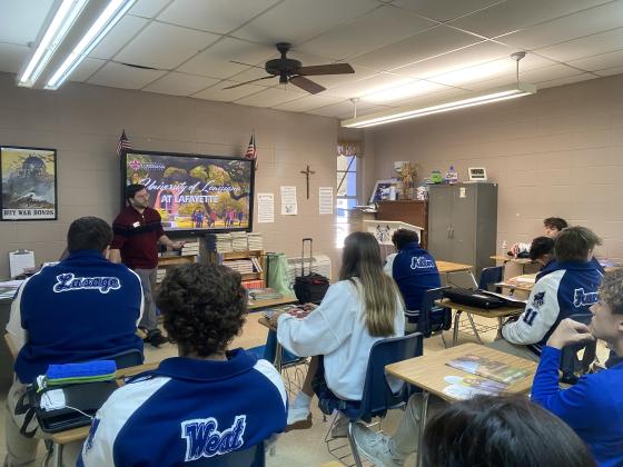 Sam Farmer, admissions counselor at UL Lafayette, presented information to St. Edmund High juniors.