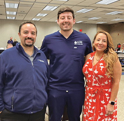 David J. Gonzalez, DMD, center with Acadiana Smiles was the guest speaker at the Eunice Rotary Club Wednesday. He had his own guests with him, from left Daniel de la Nuez, owner of Healthy Solutions &amp; Clinic of Crowley and president-elect of the Crowley Rotary Club; and his mother Dr. Leonor Gonzalez. Leonor is an assistant professor in elementary education at LSUE. (Photo by Myra Miller)