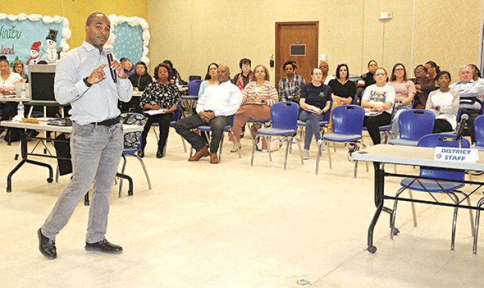 Milton Batiste III presents a cost-savings plan at St. Landry Parish School Board retreat on Saturday in Opelousas. The School Board is to meet at 5 p.m. Thursday to vote on the plan. (Photo by Harlan Kirgan)