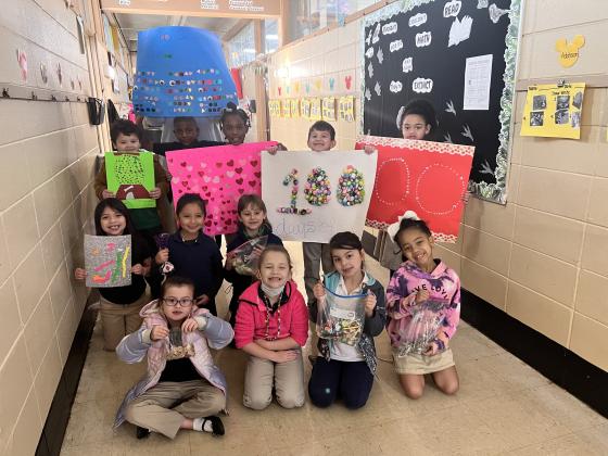 100th Day of school was celebrated at East Elementary. First graders in Caitlyn Estes class made posters. Seated, in front, from left, are Felicity Brown, Evangeline Manuel, Madison Fontenot, Olivia Leger. Kneeling, from left, are Aleyna Chavez, Mia Gonzalez, Shaun Douget. In back, from left, are Kurt Lavergne, Dakarri Janice, Nola Thomas, Paytonn Hargrave and Zillah Meyers. (Submitted photo)