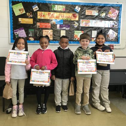 First  graders at East Elementary received awards at a Special Celebration. They were recognized for their positive behavior and great classwork for the third quarter. From left are Mariah Ferguson, Kynlee Mahon, Jaylen Thomas, Tripp Duplechin and Jiselle Castillo. Not pictured is Bryson Jack.