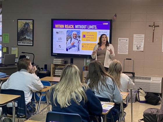 Joshua Perrodin, Director of Admissions and Recruiting, and above, Alex Hammond, Admissions Counselor and Recruiter with LSU Alexandria, talk  to juniors at St. Edmund