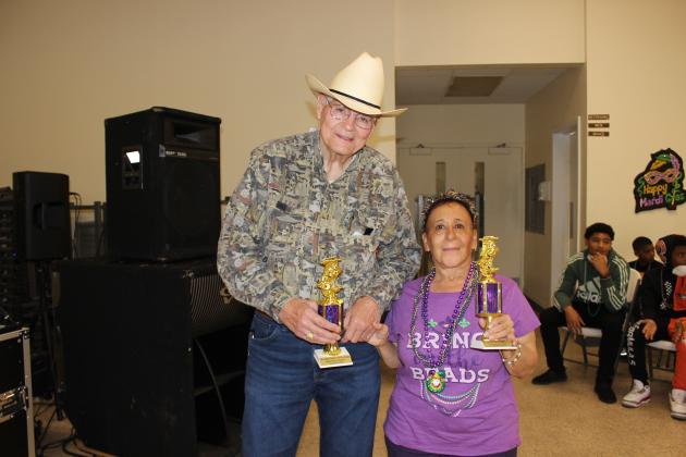 The St. Landry Council on Aging held a Mardi Gras dance for seniors Monday at the Northwest Community Center. Winning The Best Male Dancer was Dale LaFleur and Kathy Thomas won The Best Female Dancer.