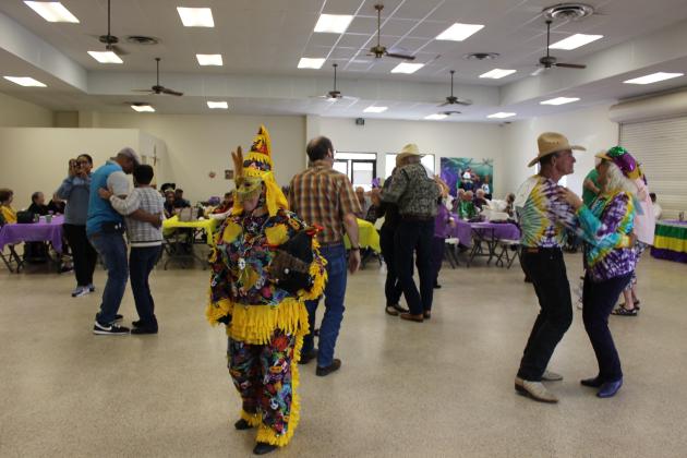 The St. Landry Council on Aging held a Mardi Gras dance for seniors Monday at the Northwest Community Center. Live music was provided by J &amp; The Zydeco Dog Pound. (Photos by Myra Miller)