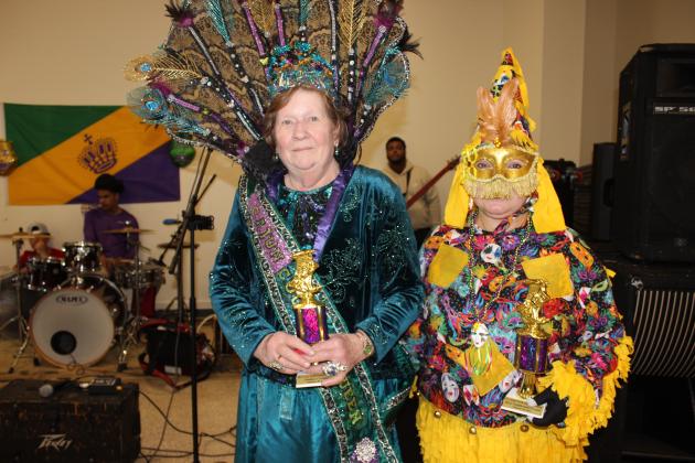 Winning The Prettiest Costume was Olita Bordelon and Christy Manuel won the Most Traditional Costume during the Council on Aging Mardi Gras dance held Monday at the Northwest Community Center.