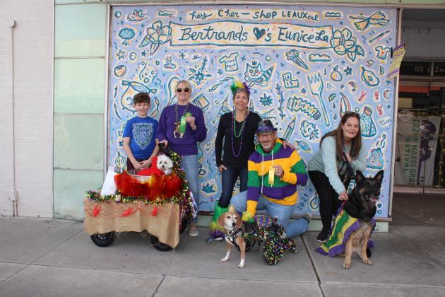 The Parade of Paws ribbon winners included, from left, Remi, the Most Creative, with Lucas Howard and owner Leslie Fontenot, Howie won Mayor’s Selection with owner Josie and Mose Highsmith; and Leela won Cajun Classic with her owner Jessica Doucet.