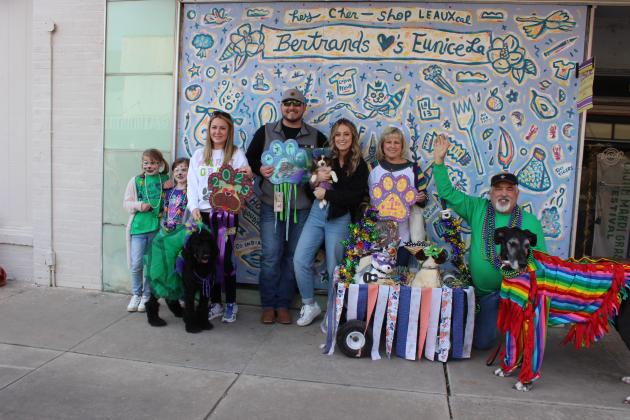 Parade of Paws was held Saturday afternoon in downtown S. 2nd with over 35 canine entries. First, second and third place winners were named as well as ribbons presented. First, second and third place winners were from left Emily Wright, Amelia LaFleur, Jessica LaFleur and Roxie, third place; Clay and Emily Francois and Josie, second place; and placing first was Finley with owners Tina and Gary Conner. (Photos by Myra Miller)