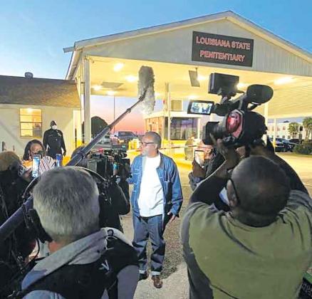 Vincent Simmons greets family, friends, supporters and a CBS national news crew as he leaves Louisiana State Penitentiary at Angola Monday night.  Simmons had served 44 years of a 100-year sentence after being convicted of two counts of attempted aggravated rape in 1977. In the hearing Monday, Judge Billy Bennett ordered a new trial, citing violations of Simmons’ constitutional rights in the original trial. District Attorney Charles Riddle said he will not prosecute Simmons, thus resulting in him being free