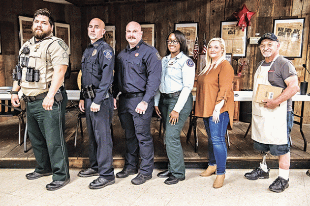 The VFW Post 8971 presented the 2023 Public Service Awards on Feb. 19. The awardees were honored, recognized and enjoyed an evening dinner meal. The VFW Post 8971 commander is Donnie Fontenot. From left, are Sgt. Damien Morgan of St. Landry Parish Sheriff’s Department; Lt. Ryan Young of the Eunice Police Department; firefighter-operator Christian Walker of the Eunice Fire Department; Chelsey Harris, the EMT of the Year; Wendy Lalonde, the 911 operator/dispatcher of the year; and James Darbonne, VFW voluntee